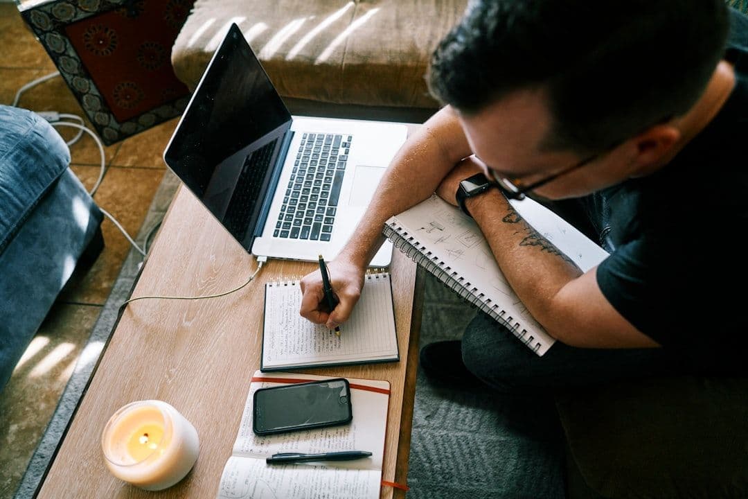Professional person reviewing and editing their resume at a desk