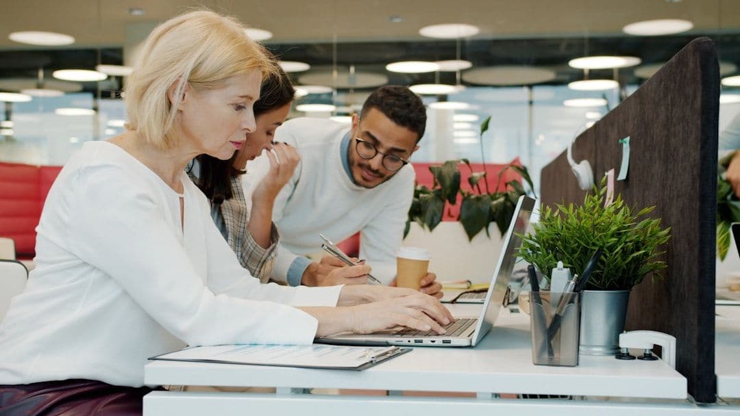 Professional HR team collaborating in modern office environment