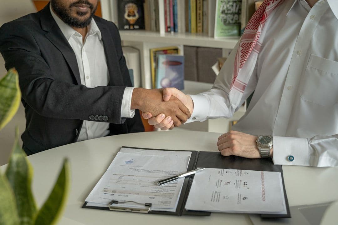 Confident professional shaking hands after successful interview