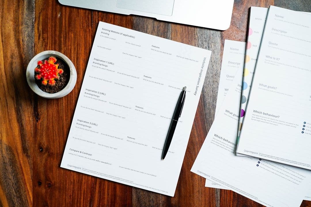Professional reviewing a resume at a desk, representing recruiter review process