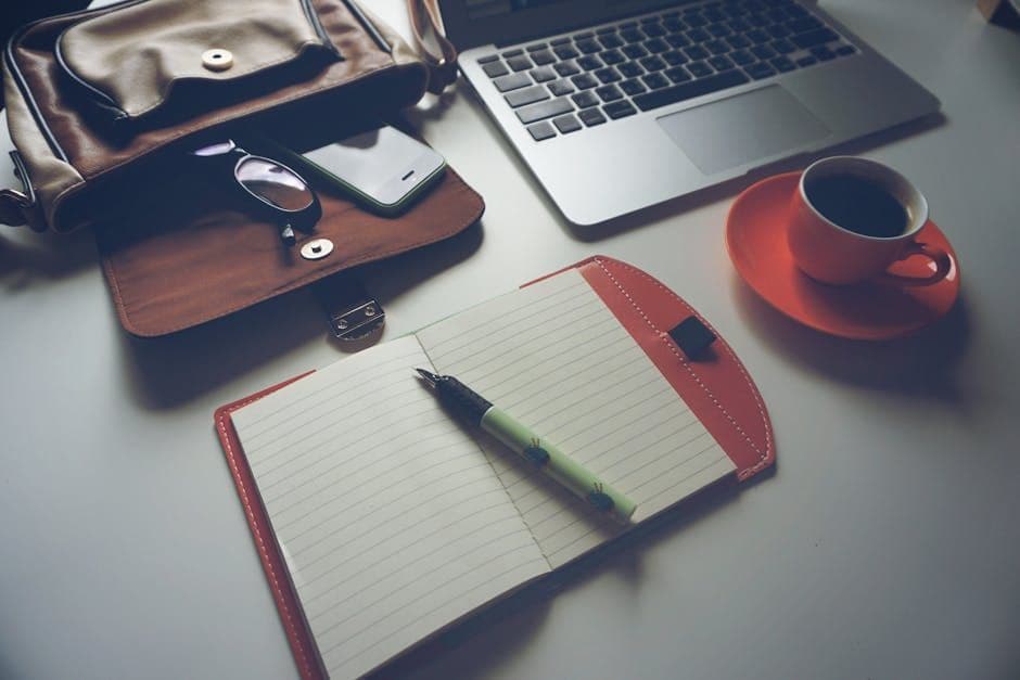 Person reviewing and editing a resume at a desk